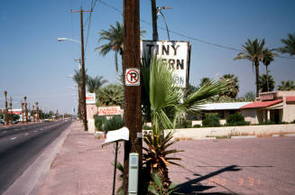Signs of 7 Palms Motel and Tiny Tavern, 2058 E. Apache