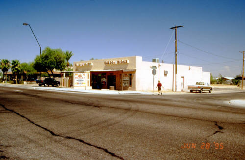 Gibson Signs and Bills Market - 2422 & 2424 E. Apache