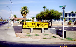 Liquor Express and A1 Income Tax Signs, 1601 E. Apache