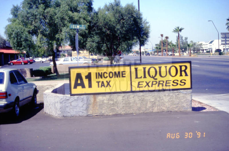 Liquor Express and A1 Income Tax Signs, 1601 E. Apache