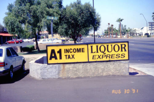 Liquor Express and A1 Income Tax Signs, 1601 E. Apache