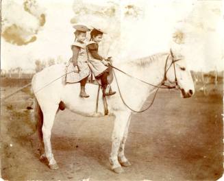Vera and Lucille Johnson Riding Horse to School