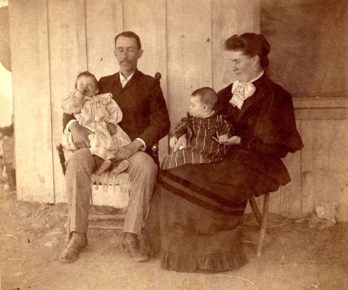 John and Mary Johnson Holding Children, Lucile and Vera