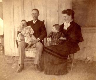 John and Mary Johnson Holding Children, Lucile and Vera