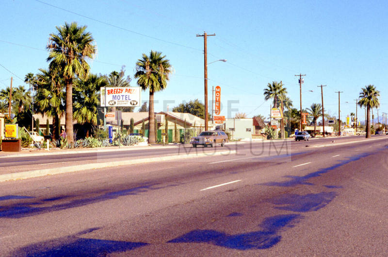 Signs along 2100 Block of Apache Blvd.