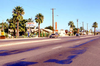 Signs along 2100 Block of Apache Blvd.