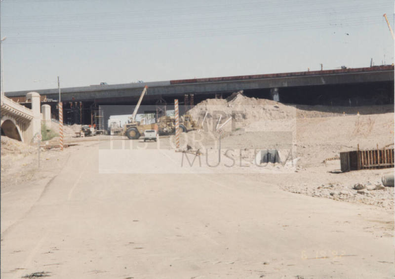 FNF Removing Soffit Fill at East Papago and Mill Avenue