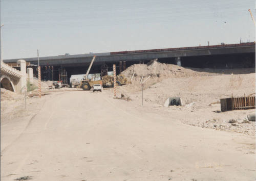 FNF Removing Soffit Fill at East Papago and Mill Avenue