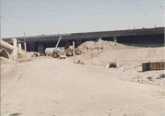 FNF Removing Soffit Fill at East Papago and Mill Avenue