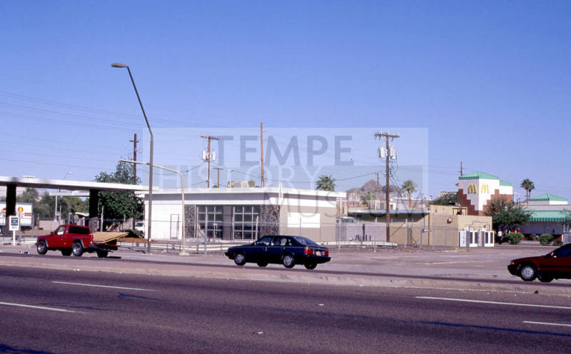 Closed service station, 904-916 E. Apache Blvd.