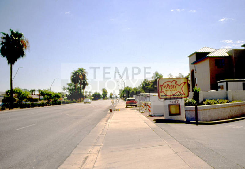 Apache Boulevard looking east at 1000 block