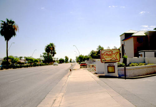 Apache Boulevard looking east at 1000 block