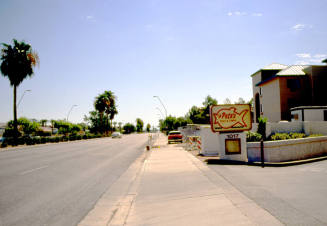 Apache Boulevard looking east at 1000 block