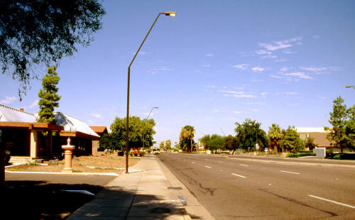 Apache Boulevard looking west at S. 1100 block
