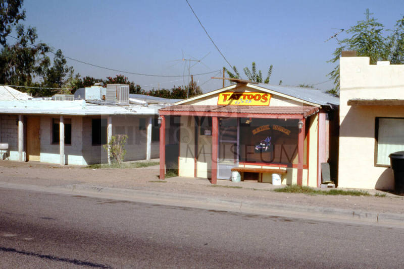 Tattoo parlor, location unknown