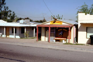 Tattoo parlor, location unknown