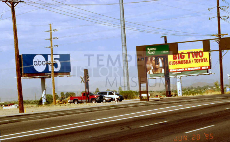 A Couple of Billboards Located near Kyrene Rd