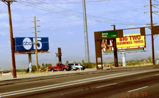 A Couple of Billboards Located near Kyrene Rd