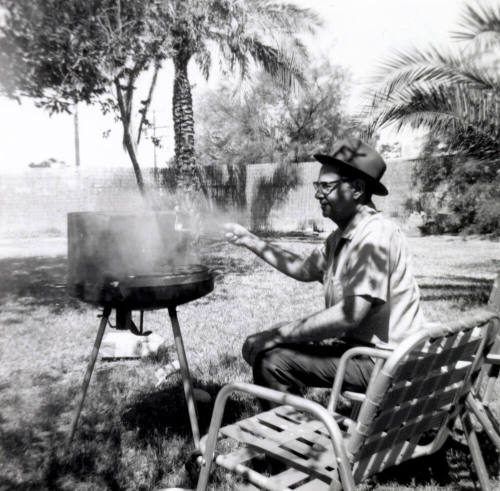Bill Hertenstein barbequing