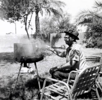 Bill Hertenstein barbequing