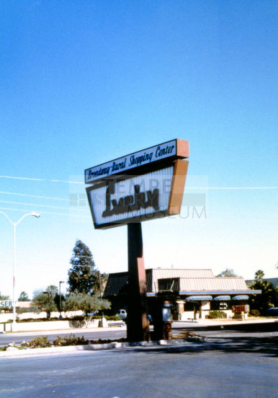 Lucky market sign, Broadway & Rural