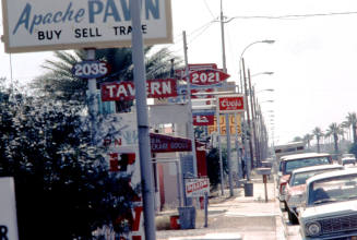 Signs along E. Apache Blvd.