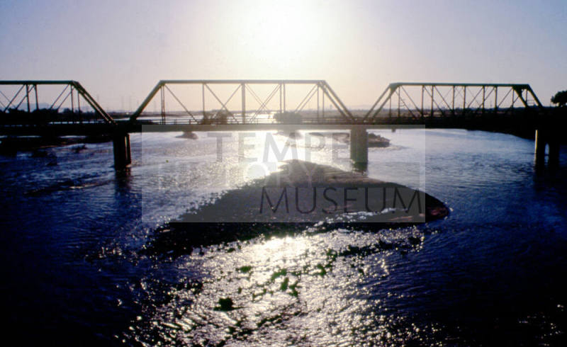Railroad bridge and floodwaters