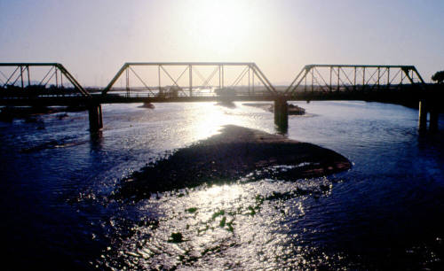 Railroad bridge and floodwaters