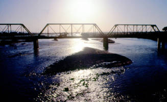 Railroad bridge and floodwaters