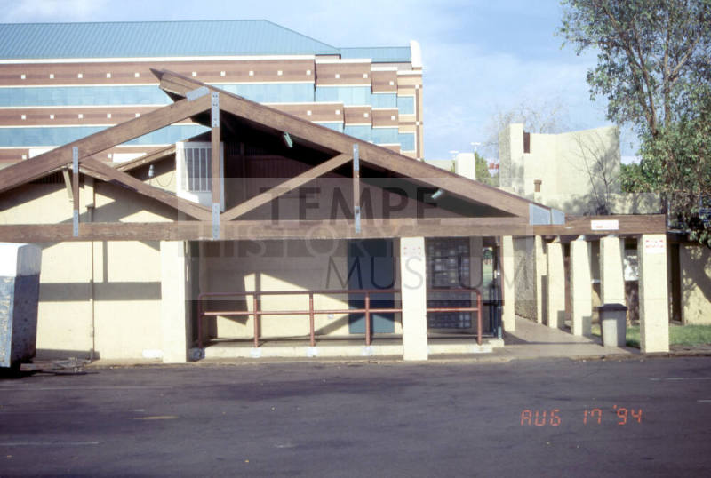Parking area behind buildings, 26 E. University Dr.