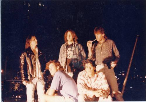 Gin Blossoms group photo outside at night