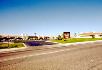 Lakes Country Village shopping center, 1000 E. Baseline Rd.