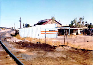 Buildings east of Mill and north of 3rd St.