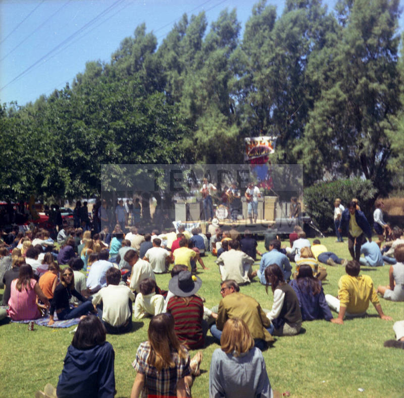 Love-in at Tempe Beach Park --Musicians on platform in front of seated audience