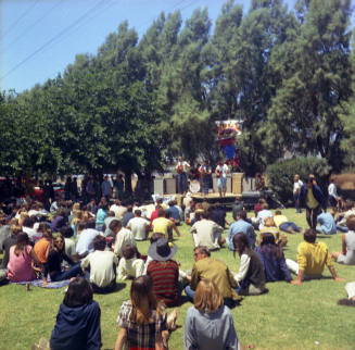 Love-in at Tempe Beach Park --Musicians on platform in front of seated audience