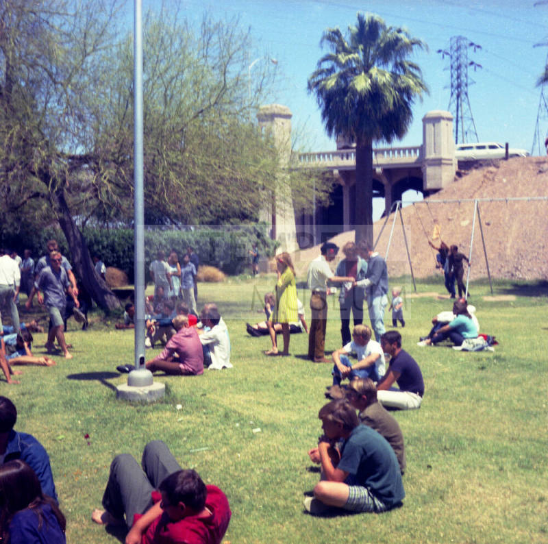 Love-in at Tempe Beach Park --Light pole and performers on platform
