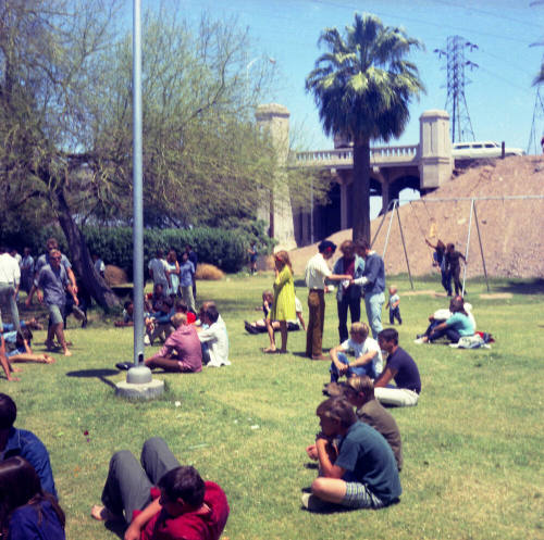 Love-in at Tempe Beach Park --Light pole and performers on platform