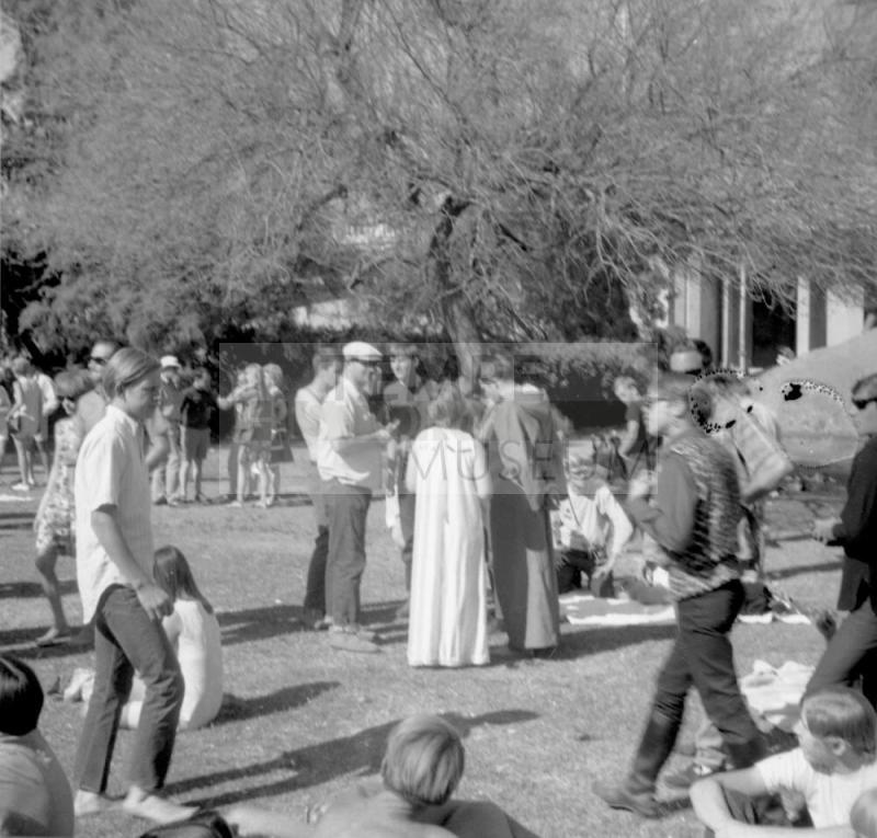 3 photographs, Love-In at Tempe Beach Park --2 of couple on lawn; standing crowd scene 2nd & 3rd photos now 2004.19.262 & 2004.19.263