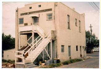 Rear View of Two-Story Stucco Buildingin Mill Ave. Area