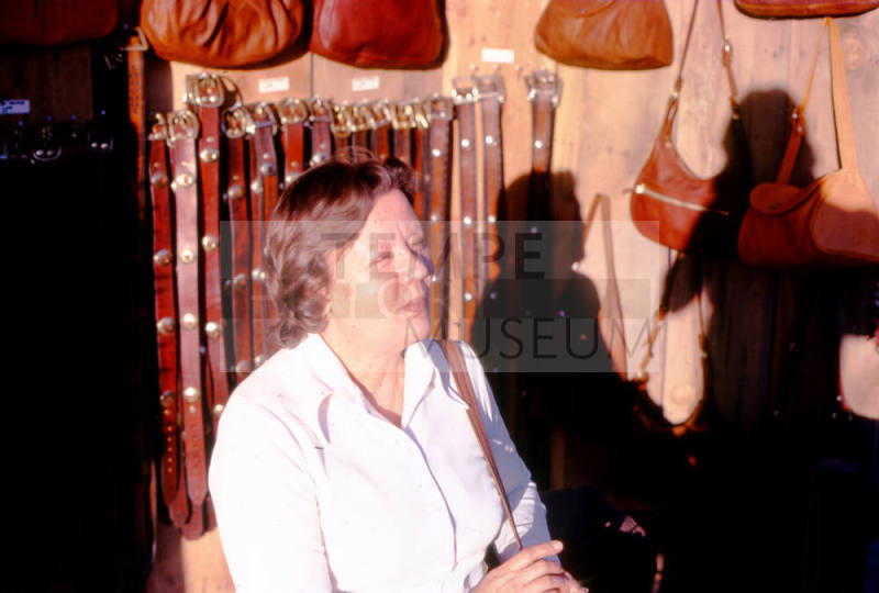 Woman at 1977 Haydens Ferry Arts & Craft Fair leather booth