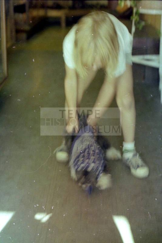 Kid with Dog at Euphoria Leather