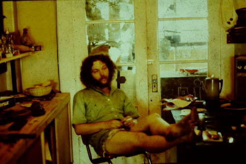 Man Leaning Back in Chair