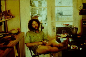 Man Leaning Back in Chair