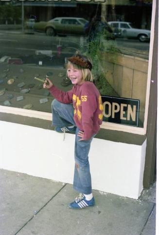 Kid Holding Cigar