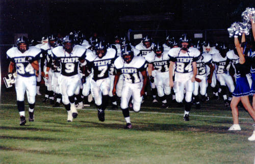 Tempe High School - Football Players Running onto Field