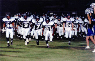 Tempe High School - Football Players Running onto Field
