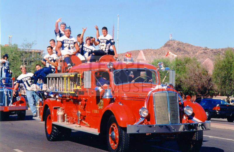 Tempe High School - Students Riding on Old Fire Truck during Parade