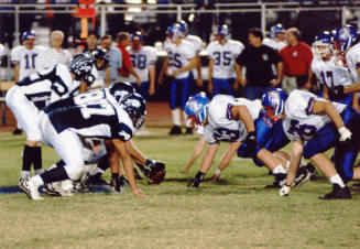 Tempe High School - Color photograph of Football Players Lined Up for a Down