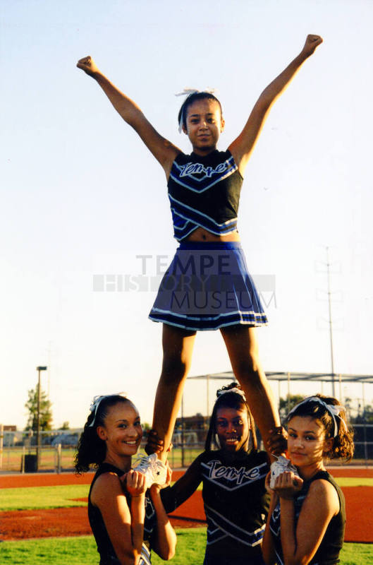 Tempe High School - Four Cheerleaders, Holding One Up High