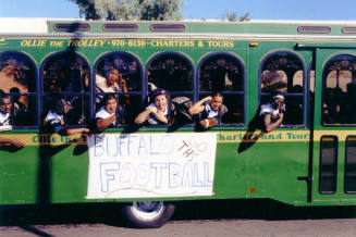 Tempe High School - Football Team Riding "Ollie the Trolley" at Parade